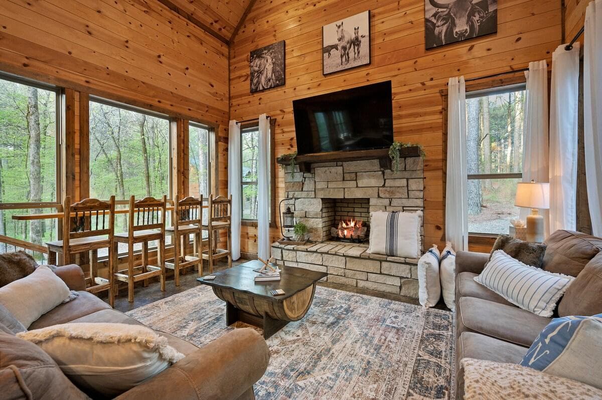 Grab a pillow and snuggle up by the fire for some Hochatown family bonding time!