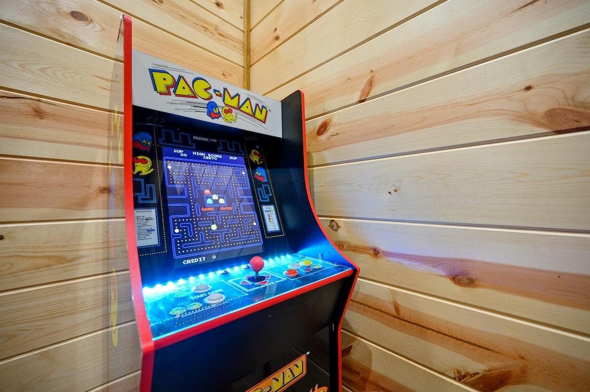 Whether you're a kid or a kid at heart, this classic Pac-Man arcade game is sure to be a hit for the whole family.
